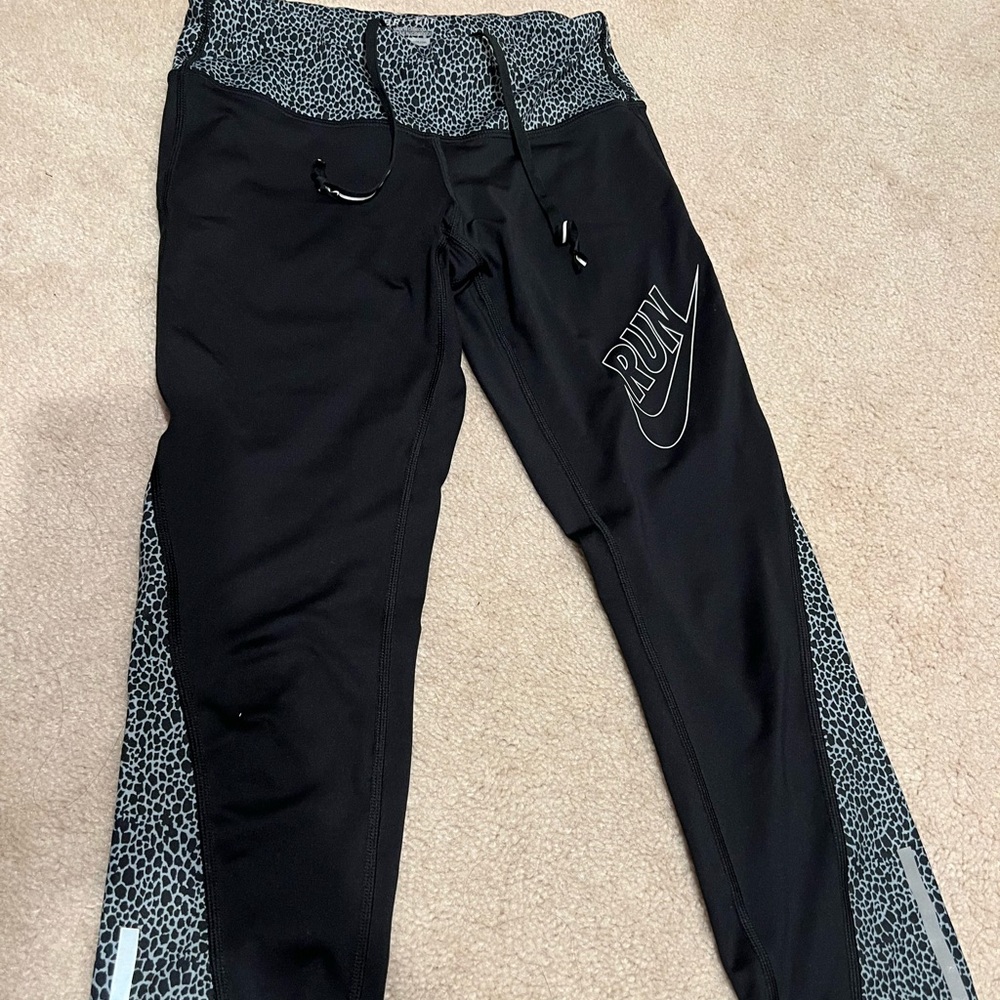 Nike - Dri- Fit black, blue cheetah print RUN capri pants